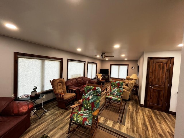 living room featuring baseboards, a ceiling fan, recessed lighting, and wood finished floors