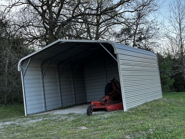 view of outdoor structure with a detached carport
