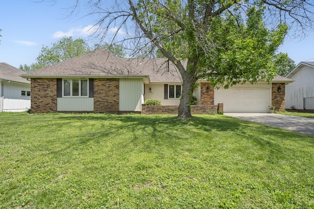 3660 S Ferguson Ave, Springfield, MO 65807 - single story home featuring concrete driveway, brick siding, a front yard, and a garage
