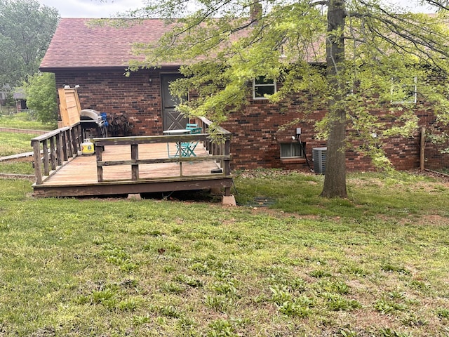 view of yard with a wooden deck