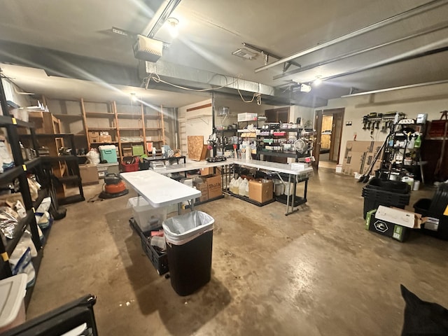 basement featuring a workshop area and a garage