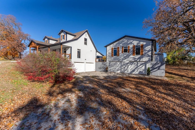 view of side of home with a garage