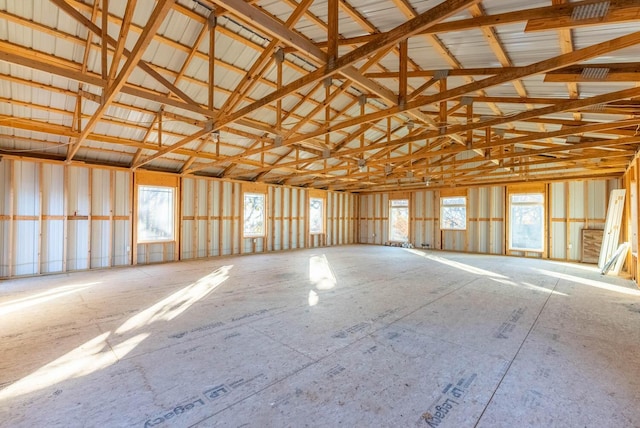misc room with lofted ceiling