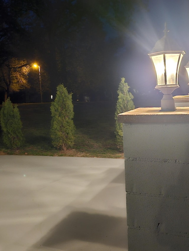 410 White Oak Dr, El Dorado Springs, MO 64744 - patio at twilight featuring a patio