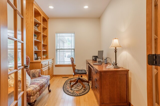 home office featuring baseboards, recessed lighting, light wood-style flooring, and visible vents