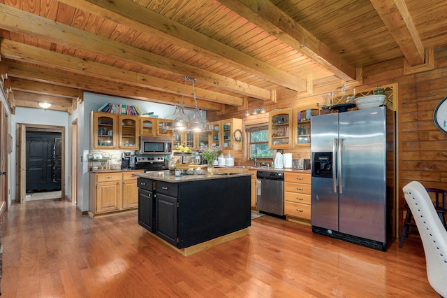 121 Waverly St, Hollister, MO 65672 - kitchen with wood ceiling, wood finished floors, beam ceiling, and stainless steel appliances