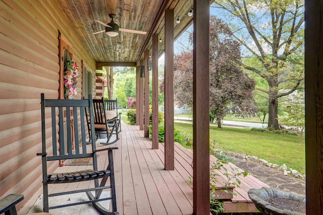 121 Waverly St, Hollister, MO 65672 - deck featuring a porch, a ceiling fan, and a yard