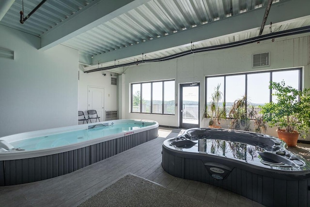 interior space with an indoor hot tub