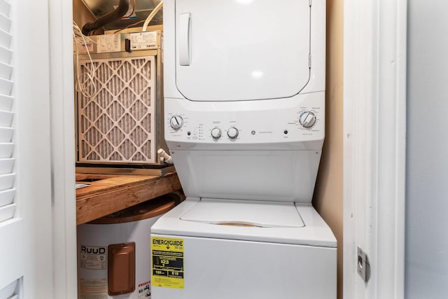 laundry area featuring laundry area and stacked washer and dryer