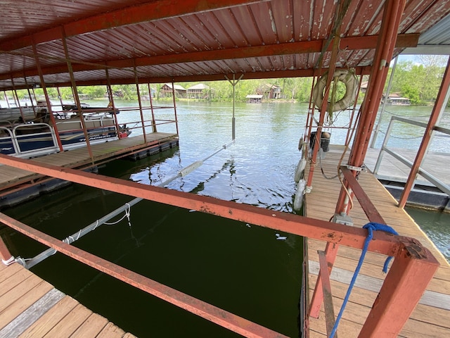 110 Wilshire Dr Unit 12, Hollister, MO 65672 - dock area featuring a water view and boat lift