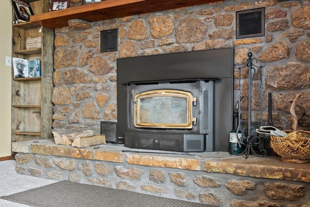 details with visible vents and a wood stove