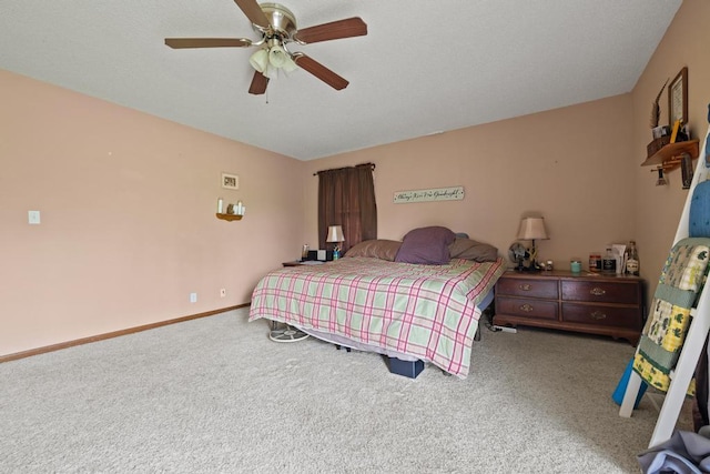 bedroom featuring baseboards, carpet, and ceiling fan