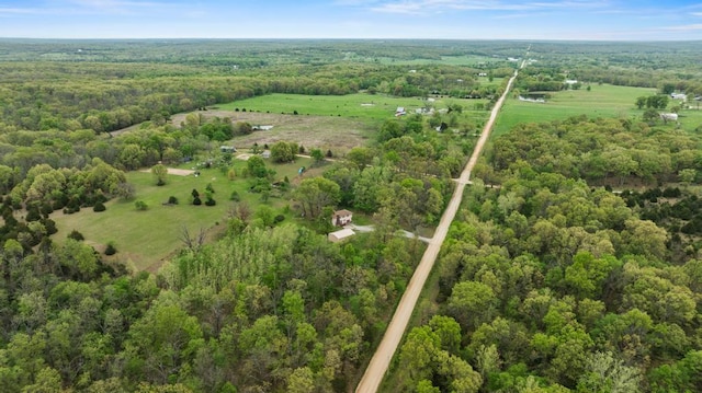 bird's eye view with a forest view and a rural view