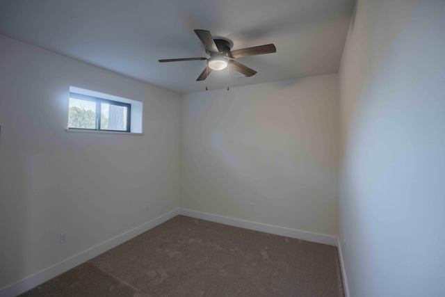 empty room with baseboards, carpet, and ceiling fan