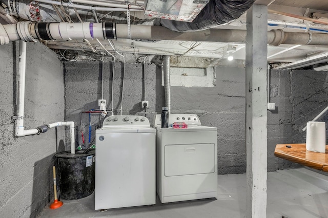 unfinished basement with washer and clothes dryer