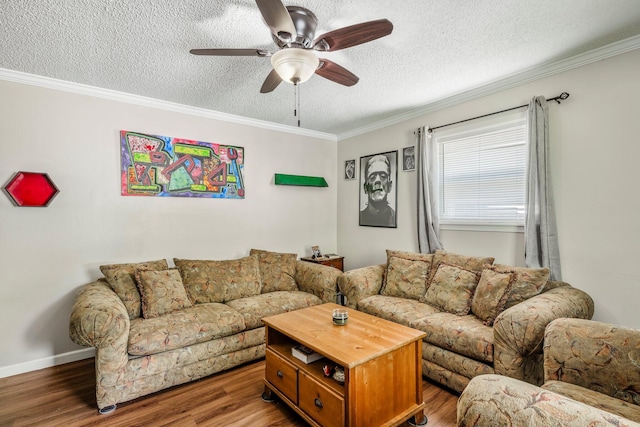 living room featuring crown molding, ceiling fan, a textured ceiling, and wood finished floors