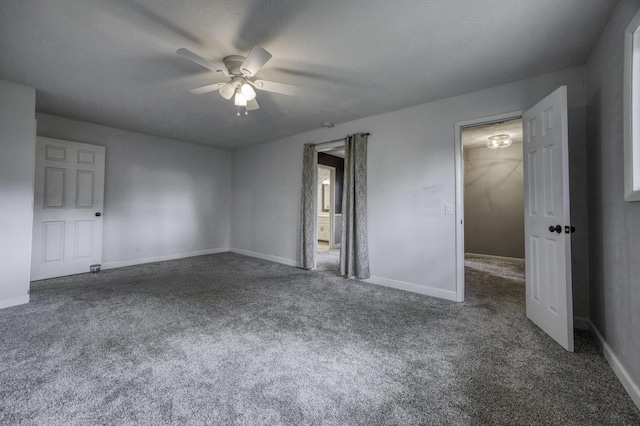 unfurnished bedroom with carpet floors, baseboards, and ceiling fan