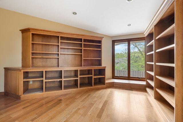 unfurnished office with recessed lighting and wood finished floors