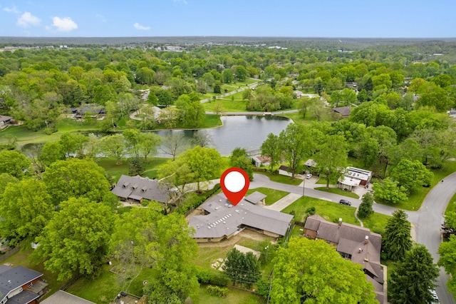 birds eye view of property with a water view and a residential view