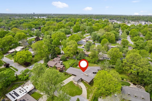 birds eye view of property with a residential view