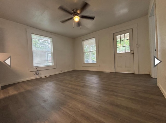 1207 W Florida St, Springfield, MO 65803 - interior space featuring baseboards, a ceiling fan, and dark wood-style flooring