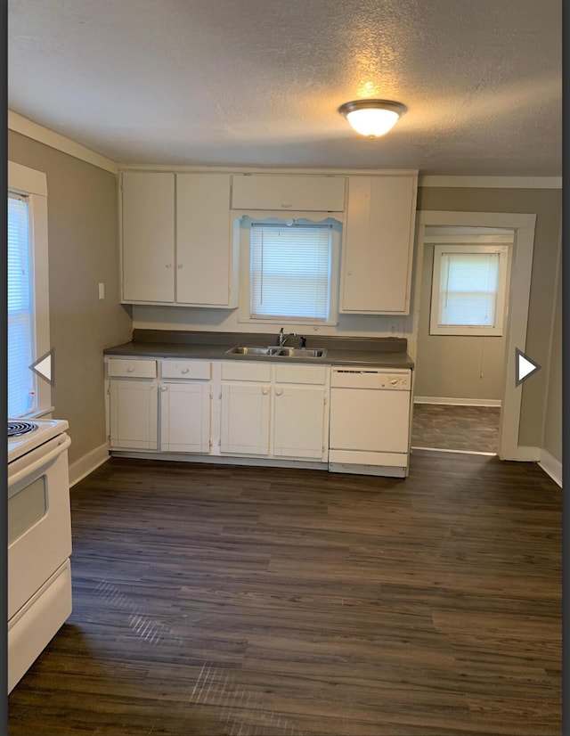 837 S Nettleton Ave, Springfield, MO 65806 - kitchen featuring baseboards, a sink, dark countertops, and white appliances