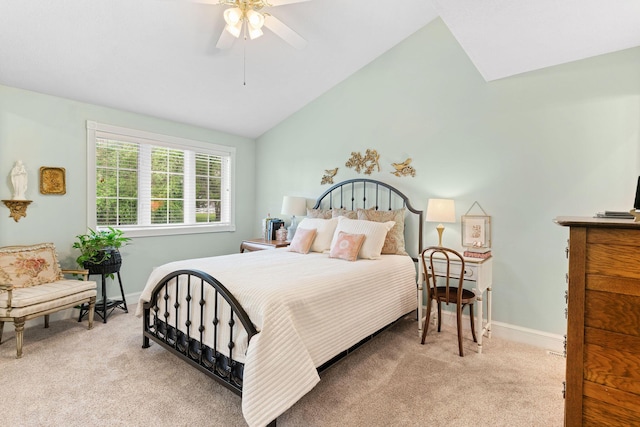 bedroom with baseboards, carpet, and lofted ceiling