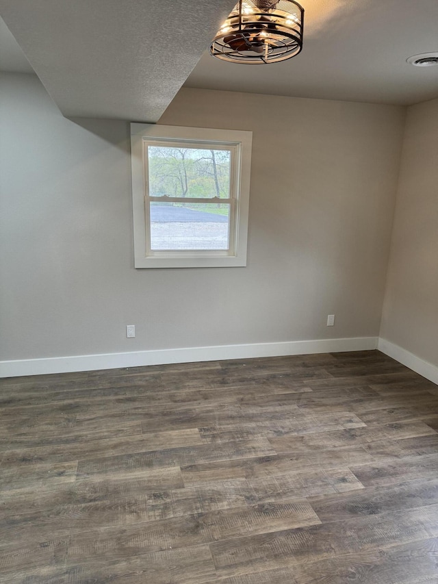 1256 Black Oak Resort Ln, Lampe, MO 65681 - unfurnished room featuring baseboards, wood finished floors, and visible vents
