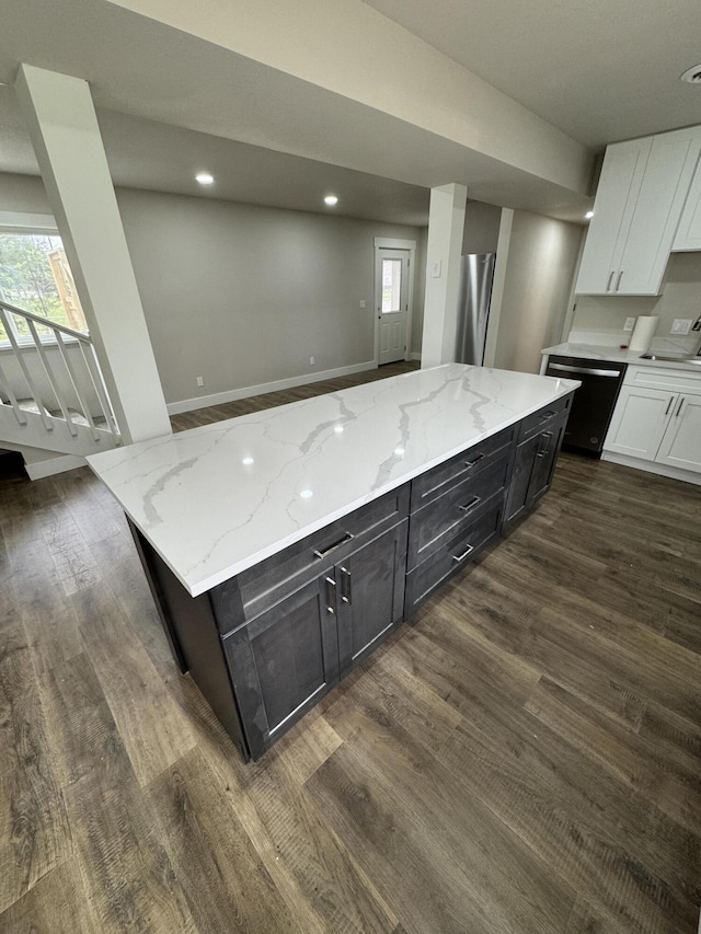 1256 Black Oak Resort Ln, Lampe, MO 65681 - kitchen featuring white cabinets, dark wood finished floors, plenty of natural light, and dishwasher