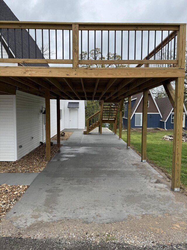 1256 Black Oak Resort Ln, Lampe, MO 65681 - view of car parking with stairs and a carport