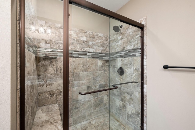 full bathroom featuring a shower stall