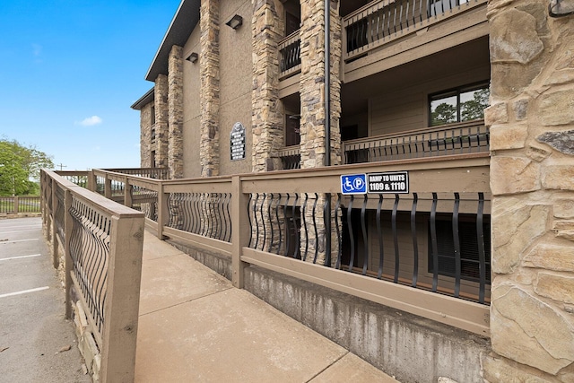 view of property with fence
