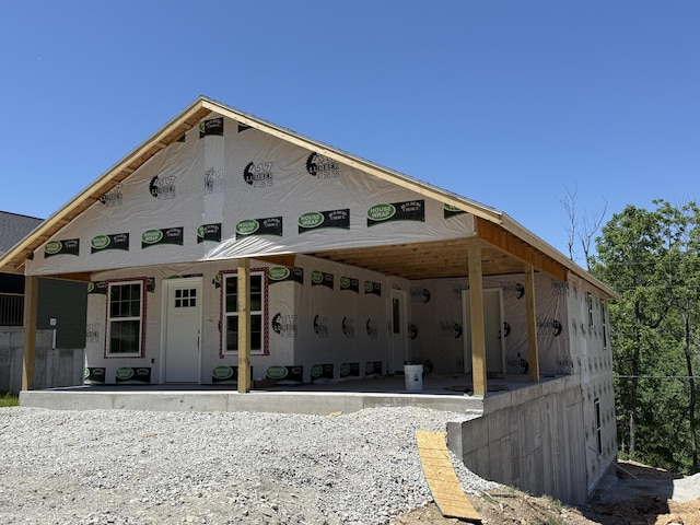 2783 Maple St, Hollister, MO 65672 - rear view of house featuring a porch