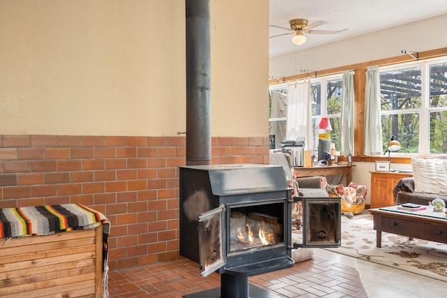 sunroom / solarium with a wood stove