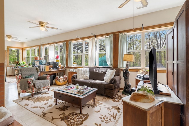 sunroom / solarium with visible vents and a wealth of natural light