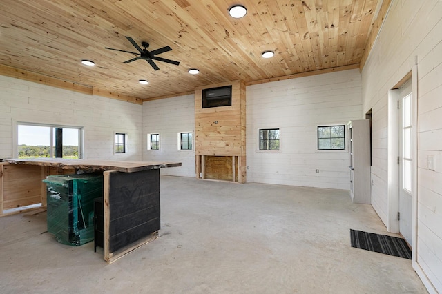 2107 E 530th Rd, Pleasant Hope, MO 65725 - living area with recessed lighting, ceiling fan, wood ceiling, and unfinished concrete floors