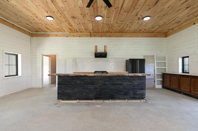 2107 E 530th Rd, Pleasant Hope, MO 65725 - interior space with a ceiling fan, wooden ceiling, and unfinished concrete floors