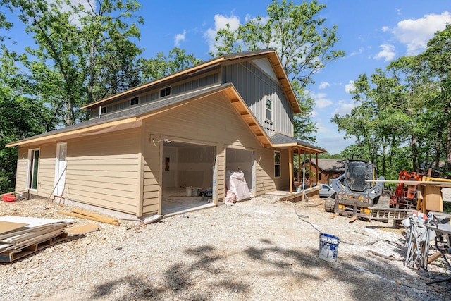 111 Ironwood St, Shell Knob, MO 65747 - view of front of house with board and batten siding