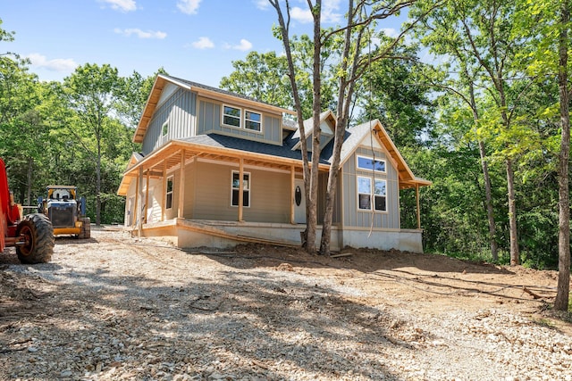 111 Ironwood St, Shell Knob, MO 65747 - view of front of property featuring covered porch and board and batten siding