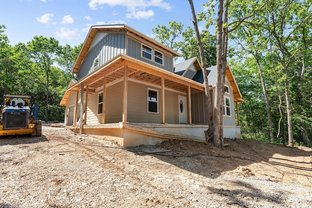 111 Ironwood St, Shell Knob, MO 65747 - view of front of home with board and batten siding and a porch