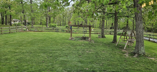 view of yard featuring fence