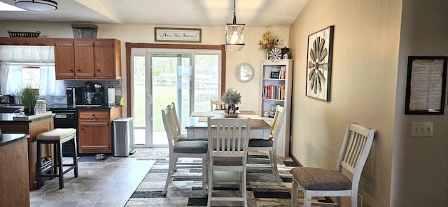 dining space featuring a healthy amount of sunlight
