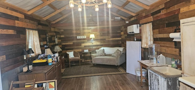 living area featuring wooden walls, wood finished floors, and lofted ceiling