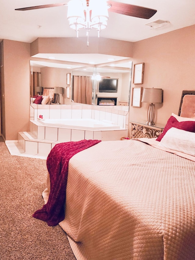 carpeted bedroom with visible vents