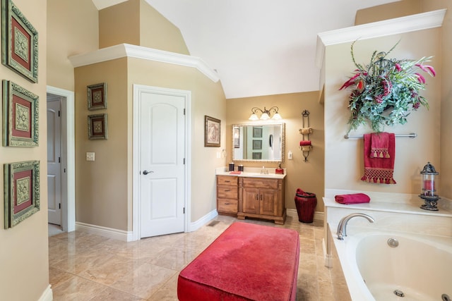 bathroom featuring baseboards, high vaulted ceiling, a garden tub, and vanity