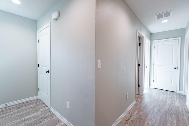 2632 N Prospect Ave, Springfield, MO 65803 - hall featuring light wood-style floors, baseboards, recessed lighting, and visible vents