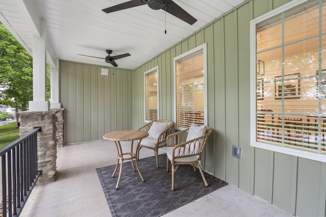 exterior space featuring ceiling fan