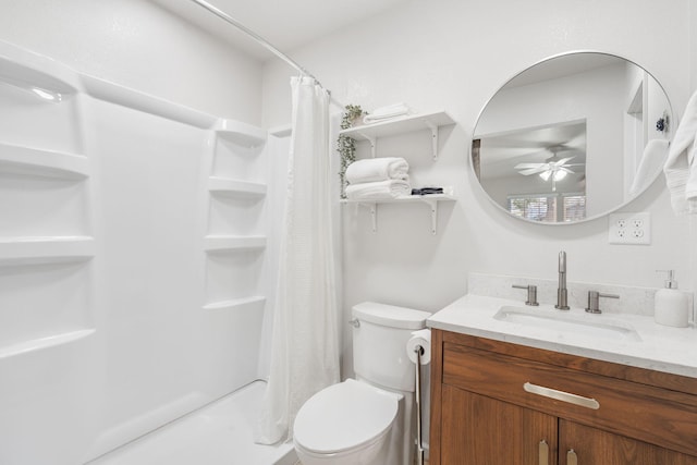 bathroom featuring vanity, ceiling fan, curtained shower, and toilet