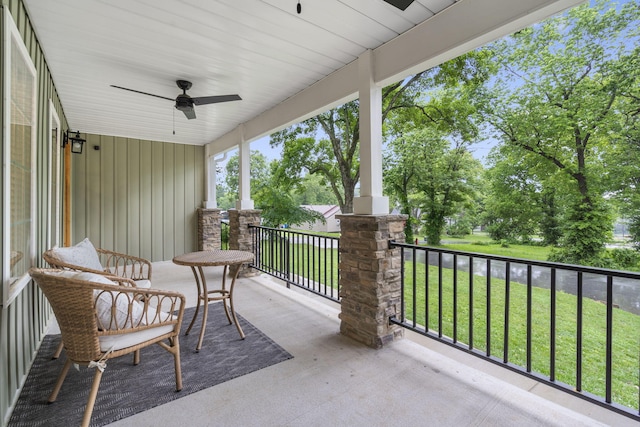 balcony featuring covered porch and ceiling fan