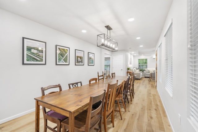 dining area featuring recessed lighting and light wood-type flooring